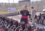 Priest blessing wheelchairs